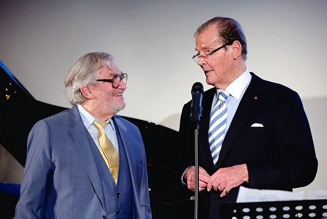 Monty with Sir Roger Moore at BAFTA April 2016